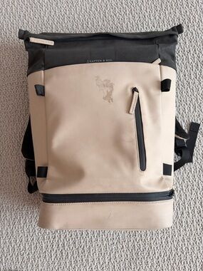 Beige and Black Roll-Top Backpack